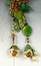 Dangling clay and glass beads